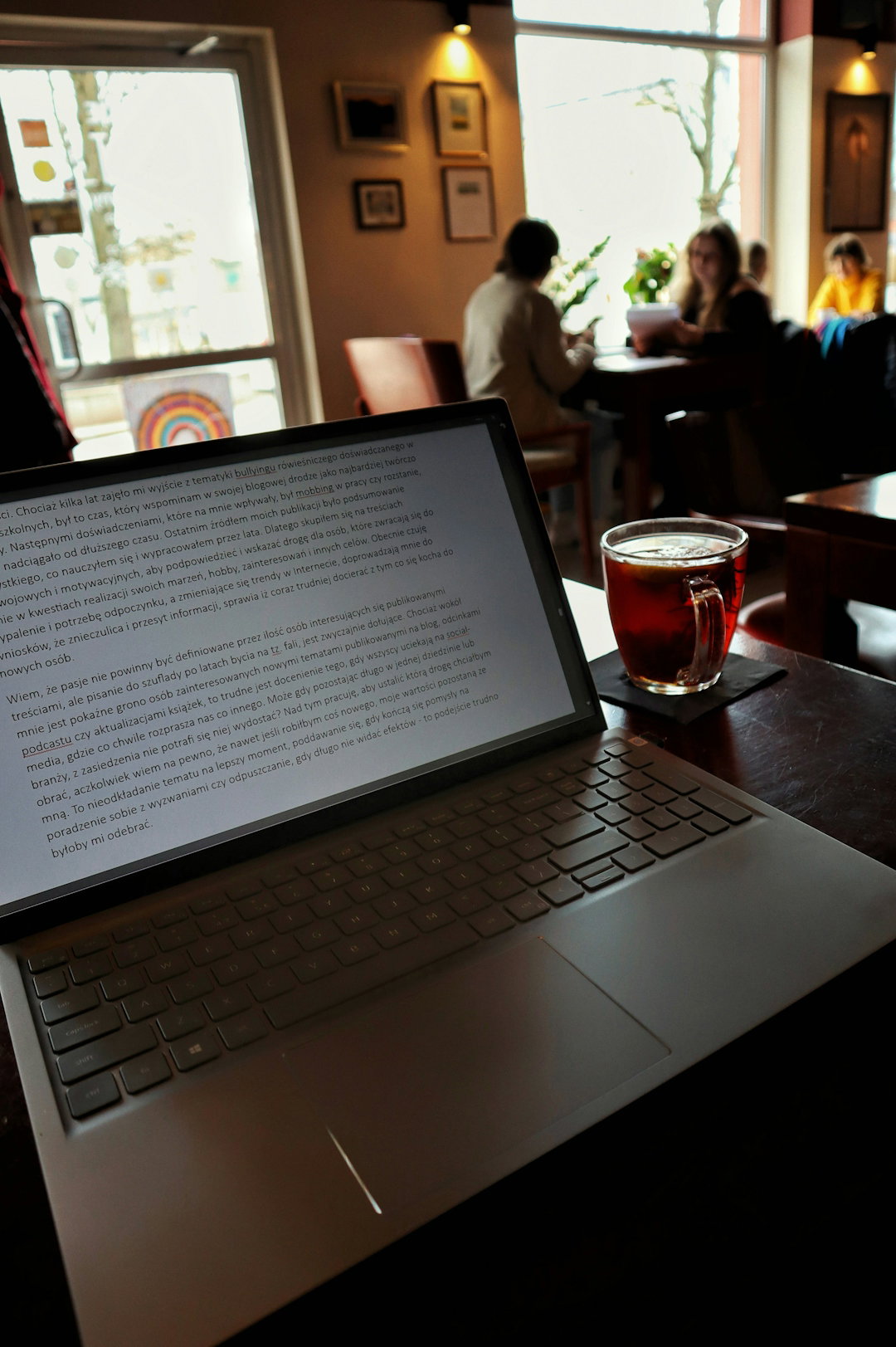 laptop-with-a-drink-in-a-coffee-shop-.jpg Laptop with a drink in a coffee shop.